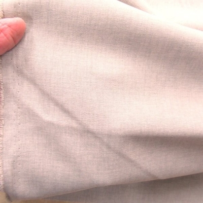 ポリ100%　先染めストレッチ　(9714-1)　グレイベージュ色