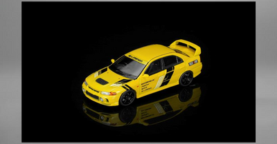MOTORHELIX 1/64 三菱 Lancer Evolution IV GSRTECKWRAPP Yellowダイキャストモデル   ボンネット脱着可能