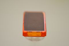 %54200 スロープ33度[透明アメ色]1x1x2/3(傾斜面[新濃灰]、斜面:粒無)