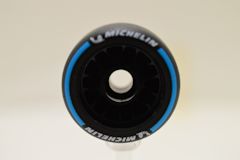 %105162 車輪[黒]24x13.4(タイヤ付、白文字 ＭＩＣＨＥＬＩＮ、ペグ穴)