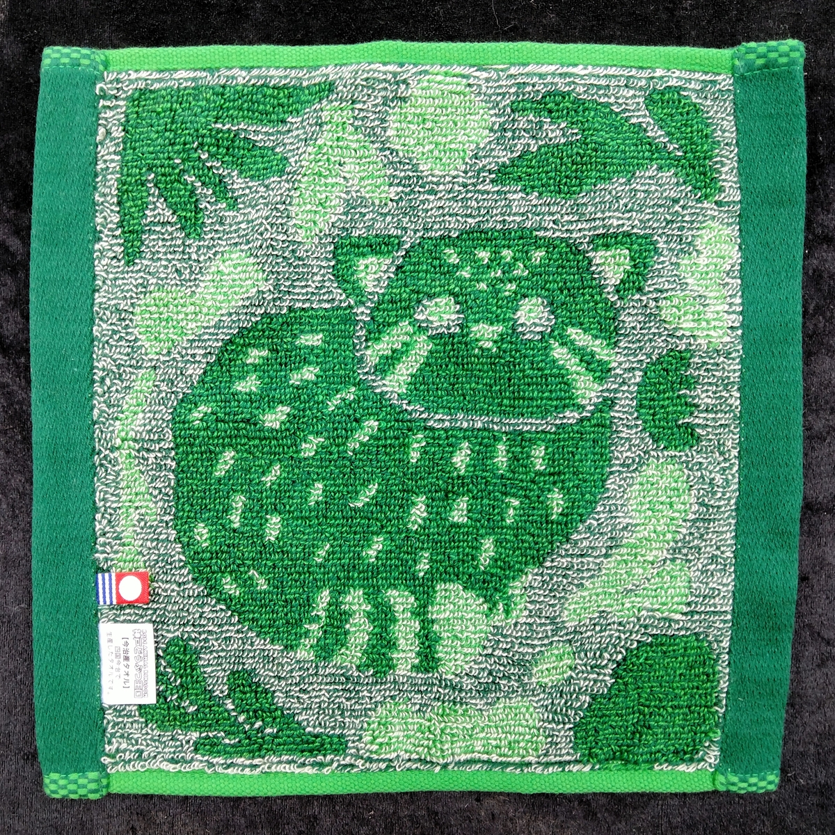 今治産ジャガードハンドタオル（グリーン） マヌルネコ | 神戸どうぶつ